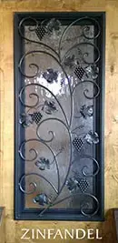 A wrought iron door with the words zinfandel on it.