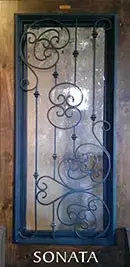 A wrought iron door with the words sonata on it.